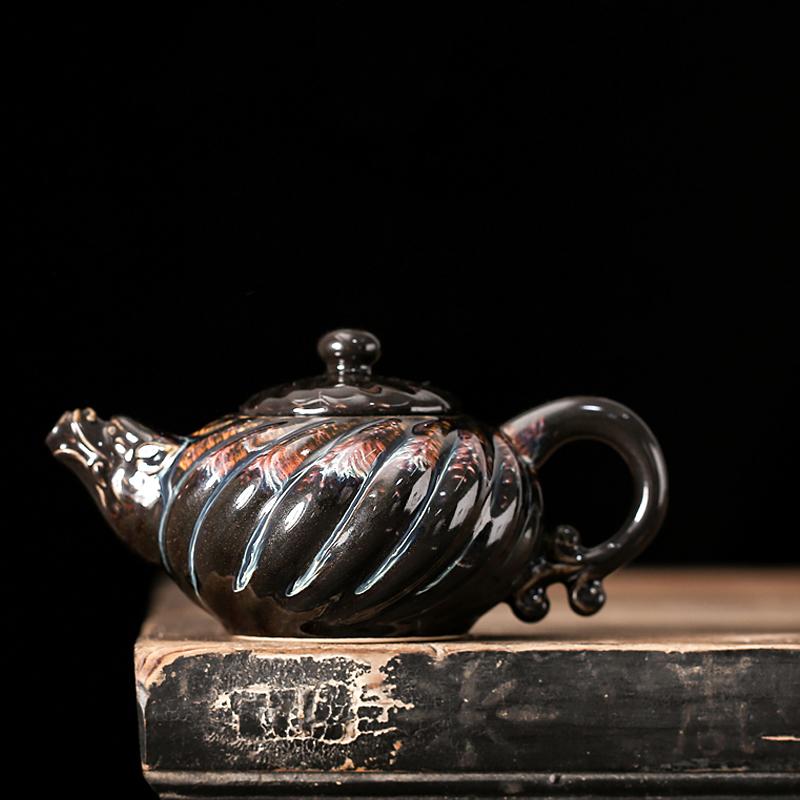 Palm teapot